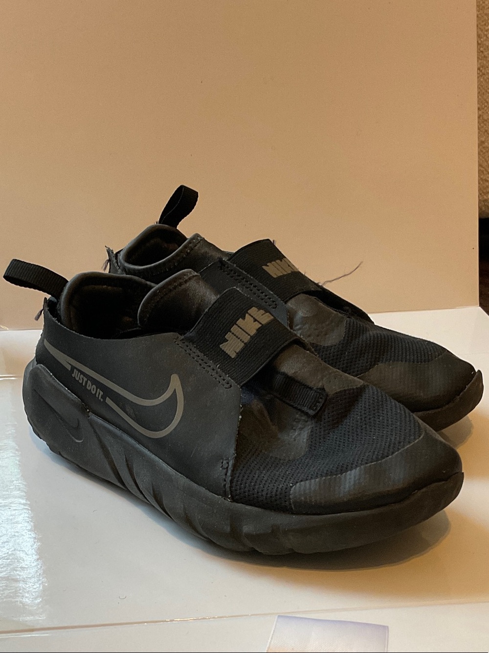 Nike Black Slip-On Mesh Sneakers with Reflective Swoosh